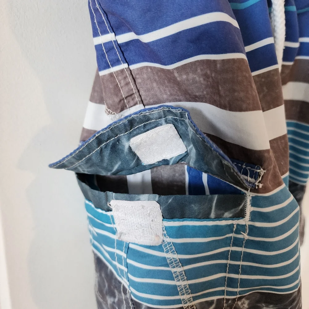 3T Quad Seven blue, gray and white swim trunks Vacation Spring Break beach shore